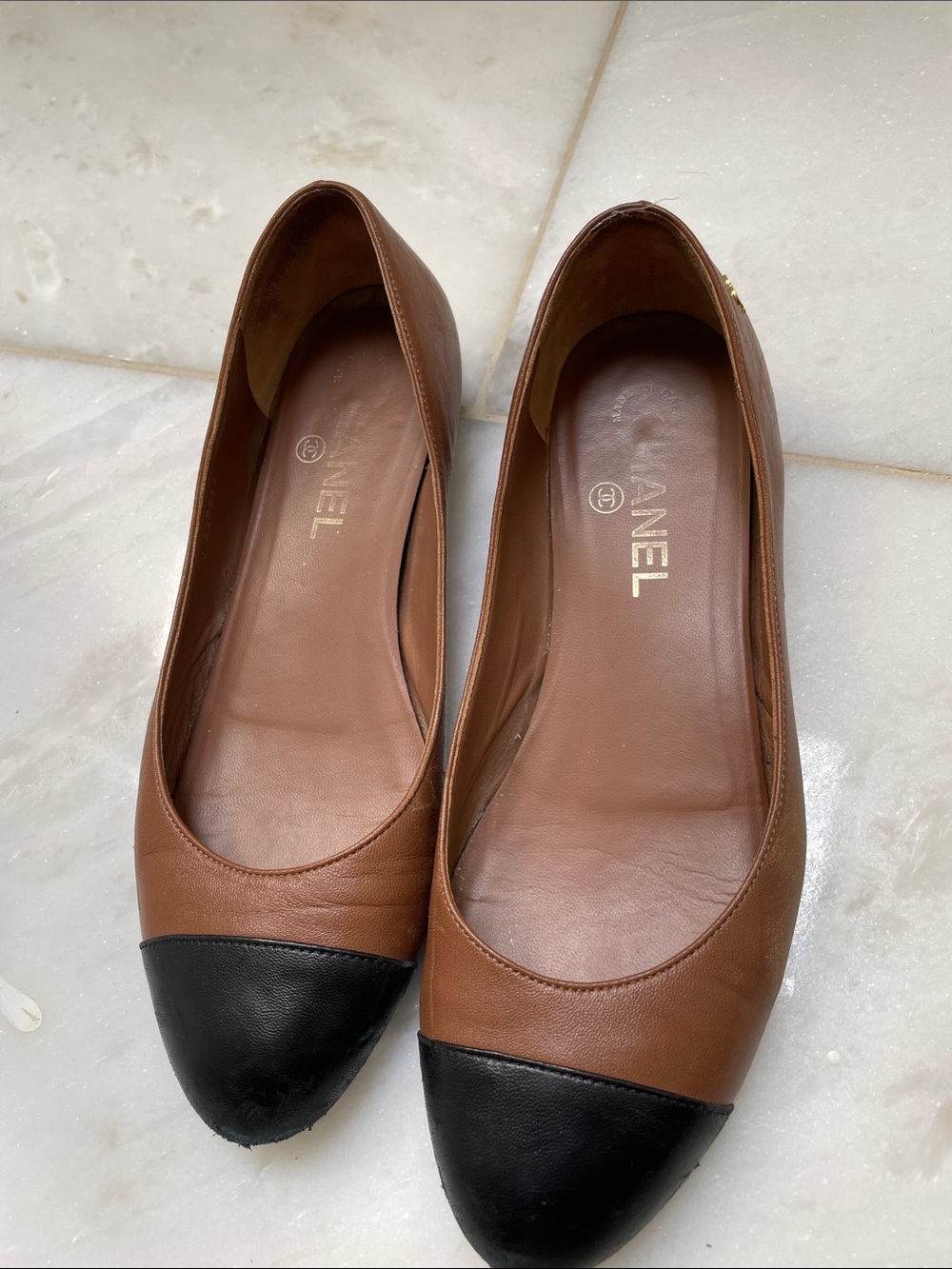 CHANEL Brown Leather Flats with Black Cap Toe